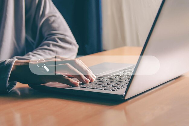 Internet search with search bar working with laptop computer in office internet networking concept
