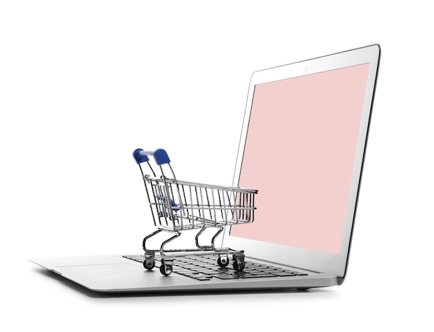 internet shopping laptop with small cart isolated on white