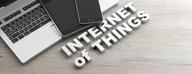 internet of things text and electronic devices wooden background banner copy space 3d illustration