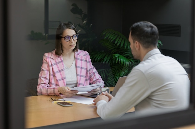 Interview or negotiation successful and beautiful business woman in her office interview