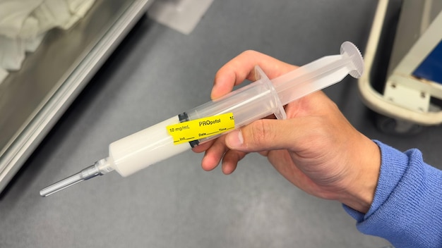 intravenous syringe with medications symbolizes medical treatment healing and patient care It rep