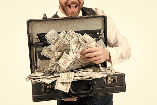 Investment cropped businessman with money bag investor hold case with dollars cash