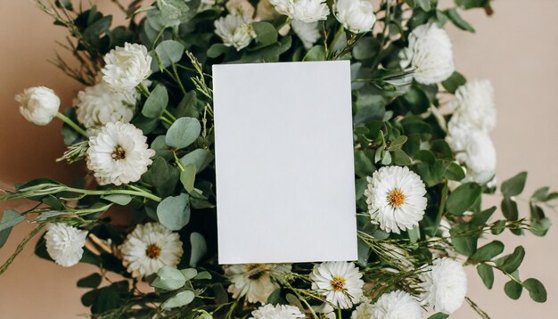 Invitation card mockup adorned with natural flowers offering a minimalist template for various occa