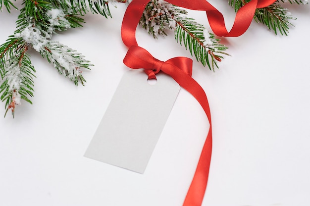 Invitation card sale for Christmas with a red bow