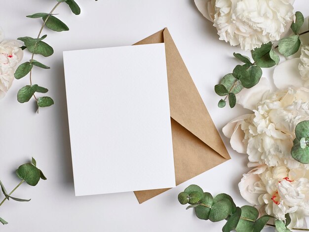 Photo invitation or greeting card mockup with flowers