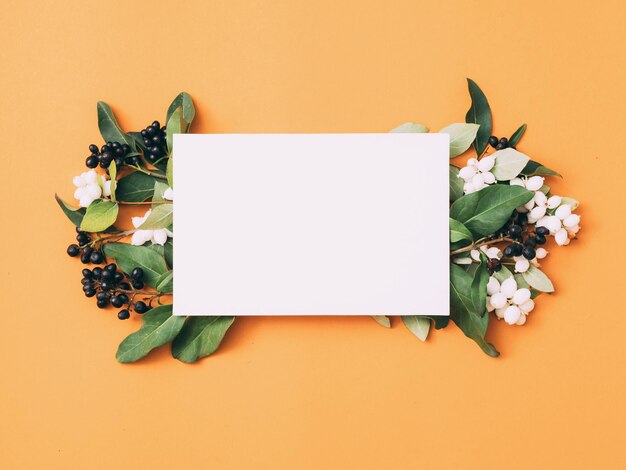 Photo invitation or greeting card mockup with flowers