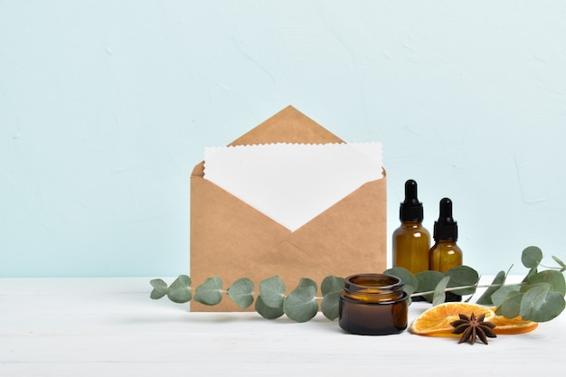 Invitation. Natural cosmetics and an envelope.