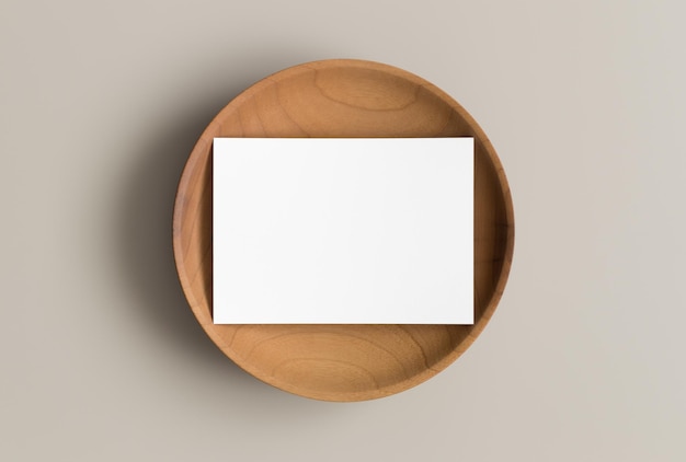 Invitation white card mockup on a wooden plate 5x7 ratio similar to A6 A5