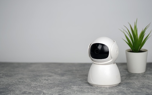 IP Camera. CCTV wireless IP security camera with 360 degrees rotating head, Concept of home security