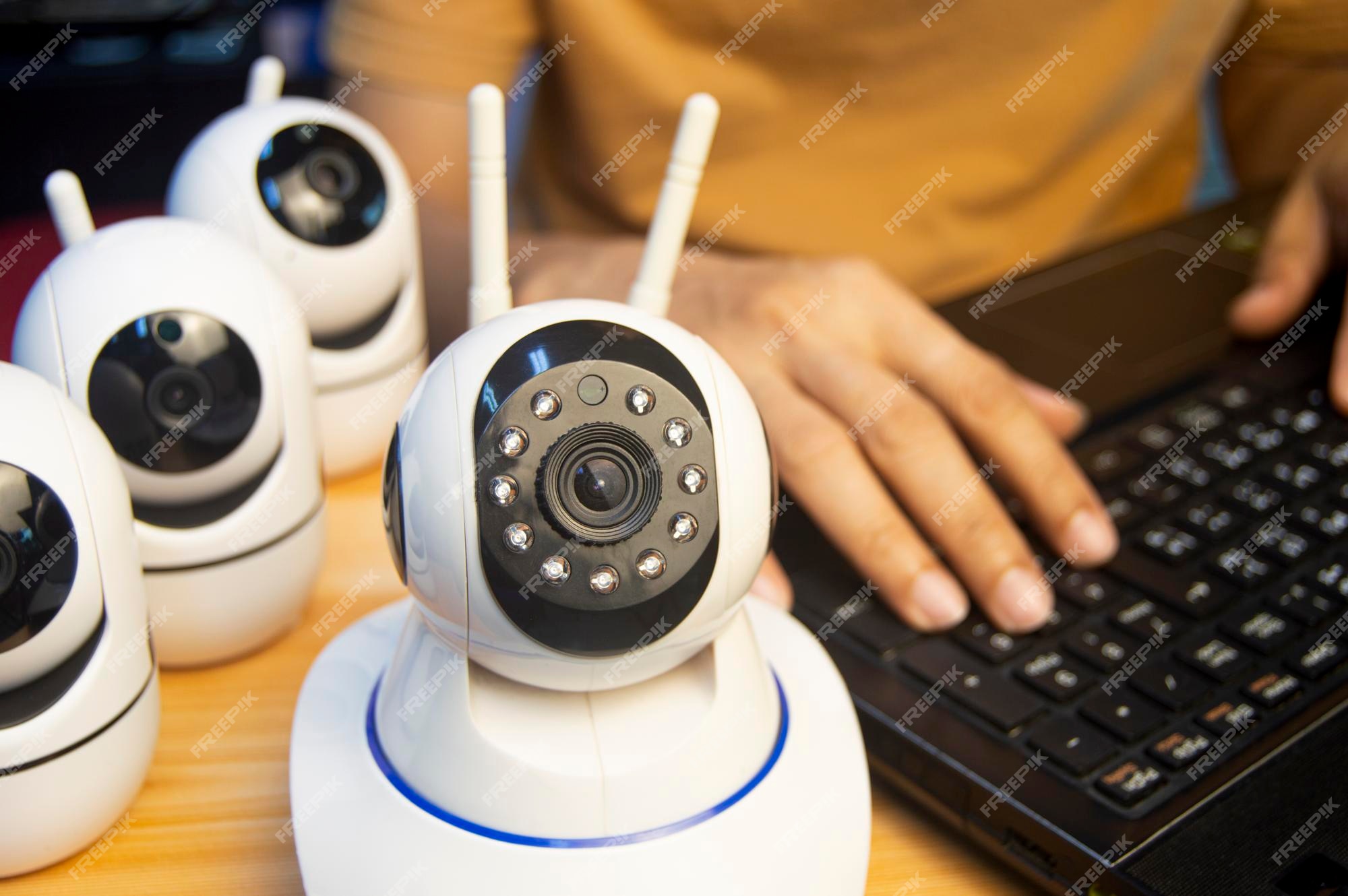 Premium Photo IP camera operator From the computer set up the IP camera