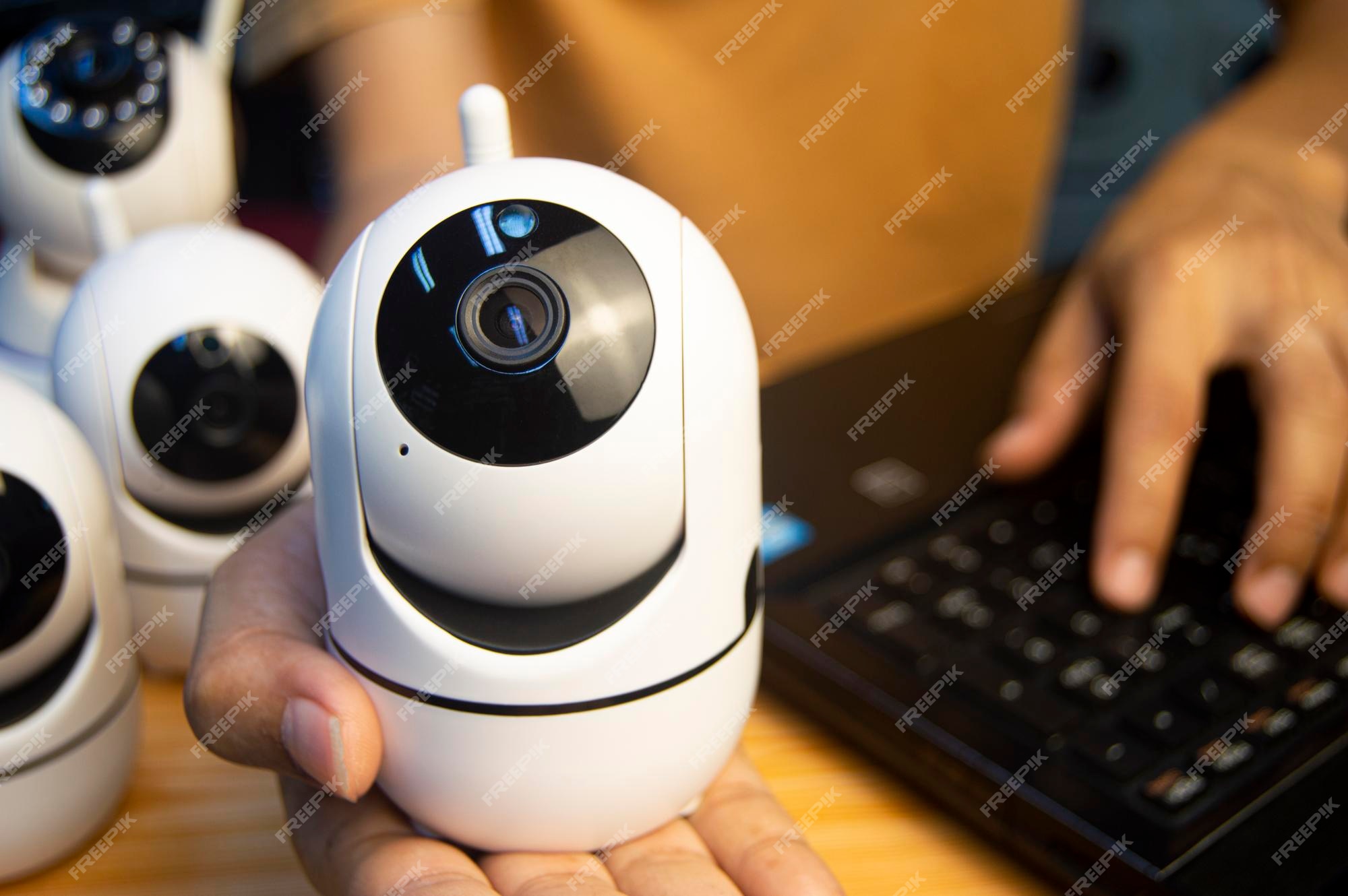 Premium Photo IP camera operator From the computer set up the IP camera