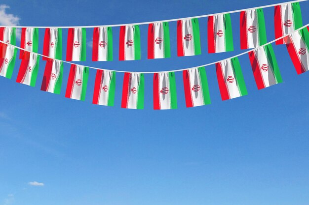 Iran flag festive bunting hanging against a blue sky d render