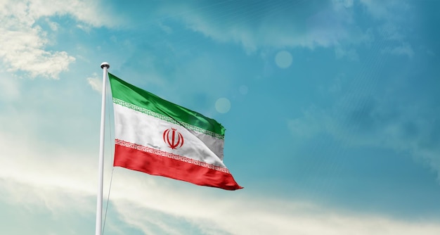 Iran national flag waving in beautiful sky