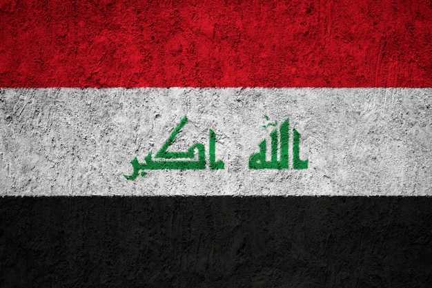 Photo iraq flag painted on grunge wall