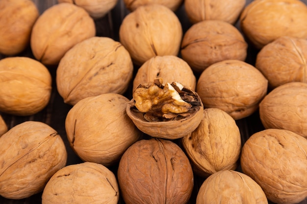 IRipe walnuts in the shell, the theme of healthy eating, vegetarianism, raw food diet.