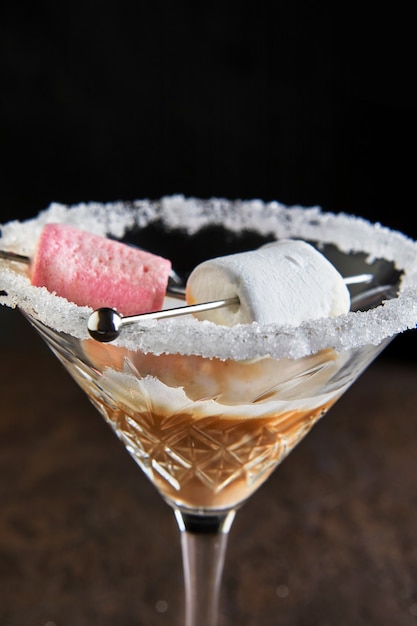 Irish cream liqueur in a martini glass with marshmallows