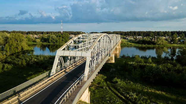 Iron bridge over the river aerial drone