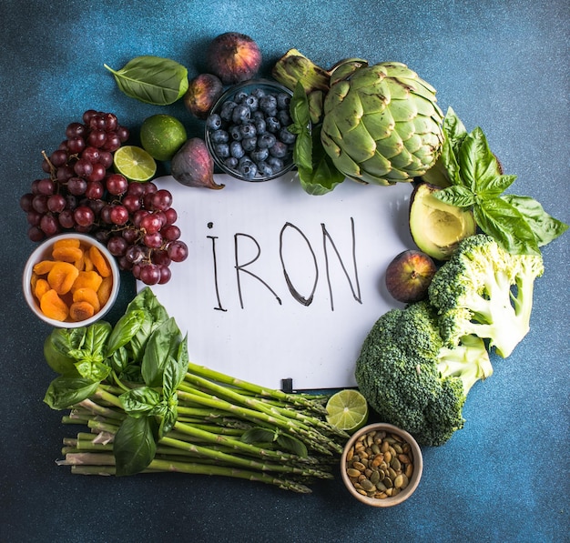 Photo iron rich food assortment of fruits and vegetables to prevent or fight anemia naturally natural sources of iron