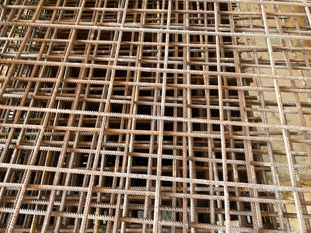 Iron rusty bars of wire reinforcement for building houses and producing industrial reinforced