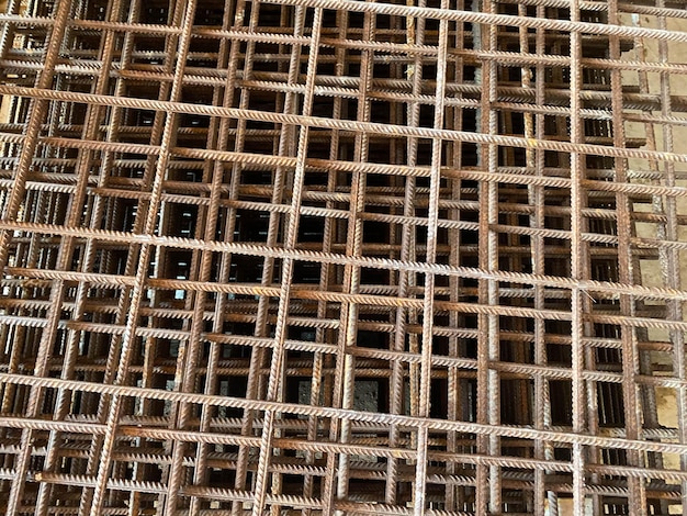 Iron rusty bars of wire reinforcement for building houses and producing industrial reinforced