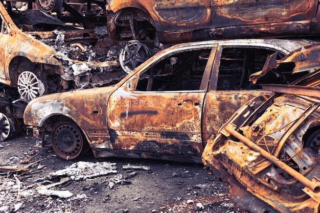 Irpin Kyiv region Ukraine 28 April 2022 Car graveyard in Irpin consequences of the invasion of the Russian army in Ukraine