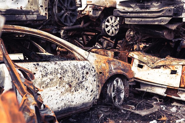 Irpin Kyiv region Ukraine 28 April 2022 Car graveyard in Irpin consequences of the invasion of the Russian army in Ukraine