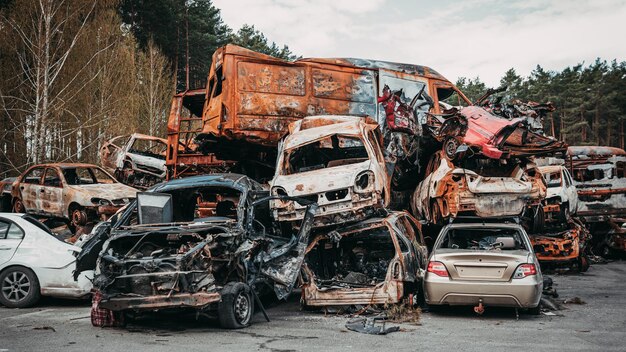 Irpin Kyiv region Ukraine 28 April 2022 Car graveyard in Irpin consequences of the invasion of the Russian army in Ukraine