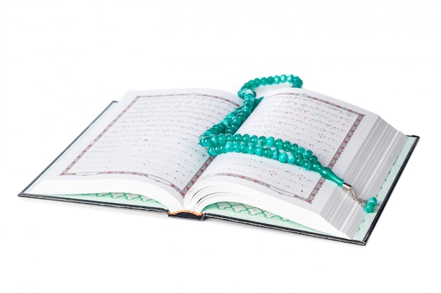 islamic book holy quran and beads