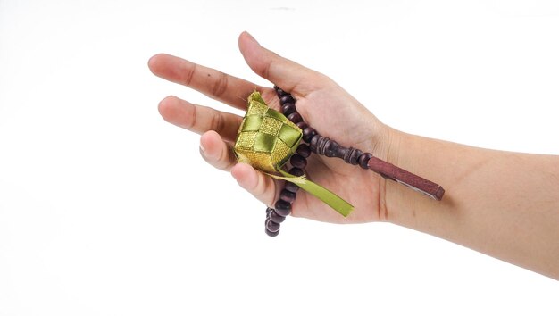 An islamic concept for Ramadhan Imge of of a tasbih with ketupat decoration