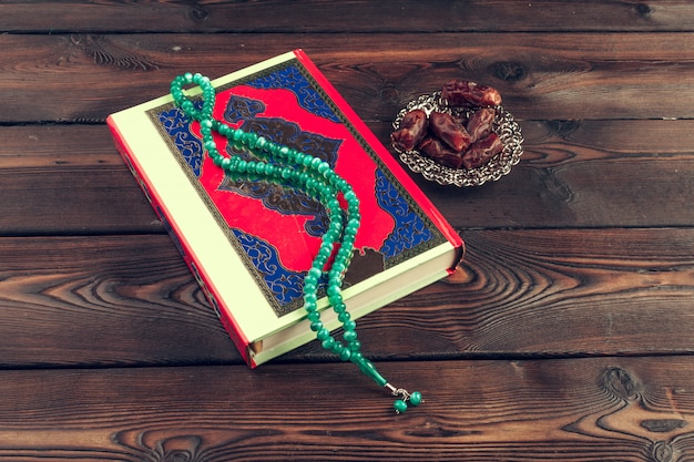 Islamic holy book on wooden table