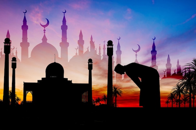 Islamic man praying muslim prayer in twilight time