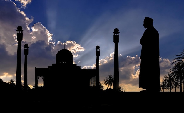 Islamic man praying Muslim Prayer in Twilight time