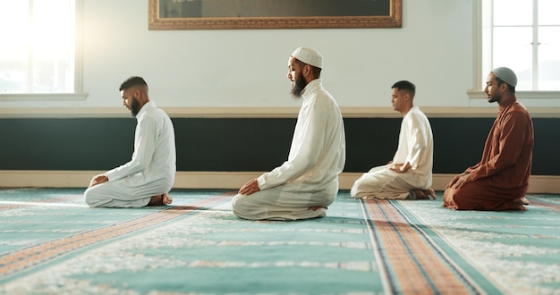 Islamic praying and holy men in a Mosque for spiritual religion together as a group to worship Allah in Ramadan Muslim Arabic and people with peace or respect for gratitude trust and hope