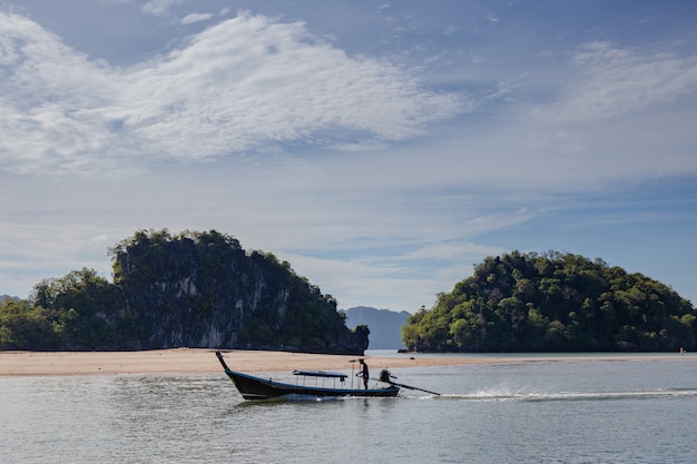 Island and blue sea with boat