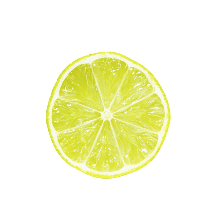 Isolate of a slice of fresh green lime on a white background.