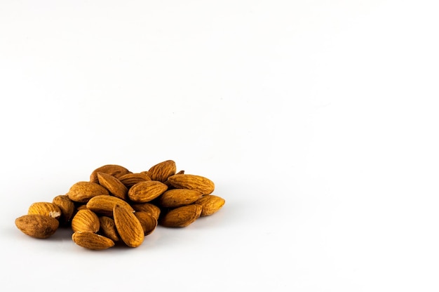 Isolated almonds on white background