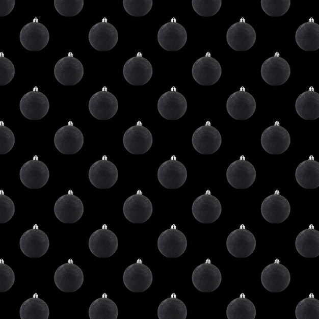 Isolated black ball on a black background Seamless pattern Christmas ornament