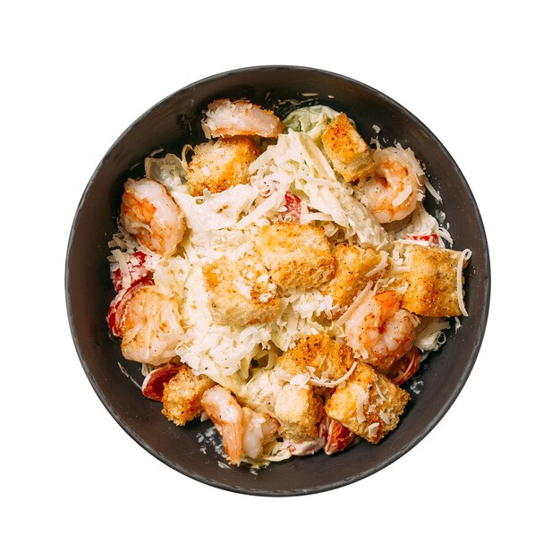 Isolated bowl of caesar with croutons and chicken