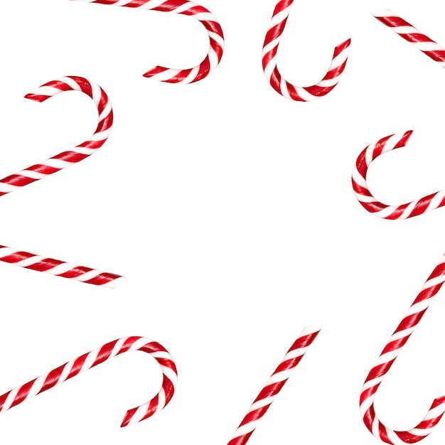 isolated bright red and white christmas candys on white background with copy space.
