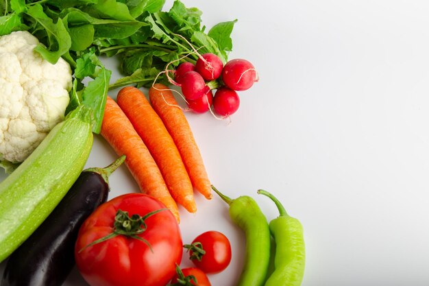 Isolated group of winter season vegetables over white flat lay view Includes copy space