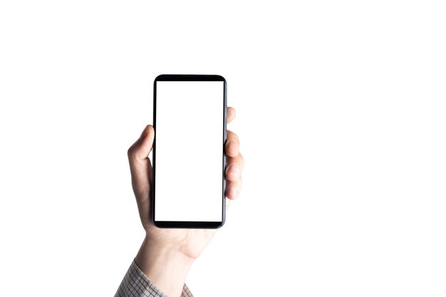 Isolated hand and phone on white wall