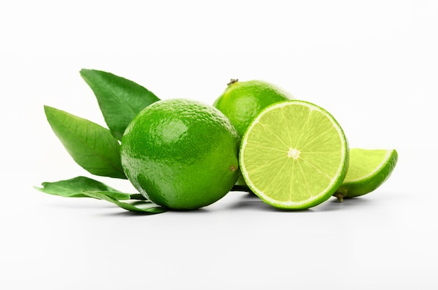 Isolated limes. Fresh cut lime fruits isolated