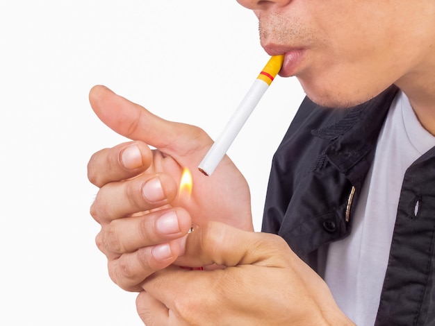 Isolated of man is burning a cigarette