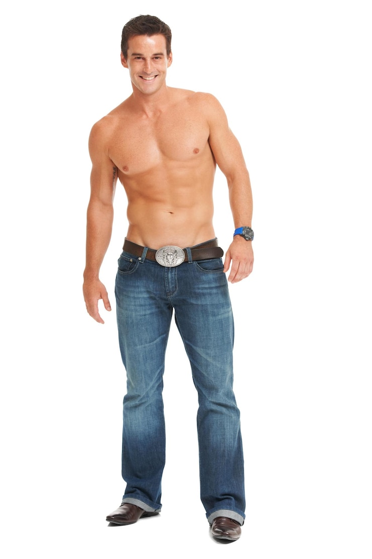 Photo isolated man smile and shirtless with jeans for fitness wellness and health by white background young male bodybuilder and happy for muscle development growth and fashion in studio portrait