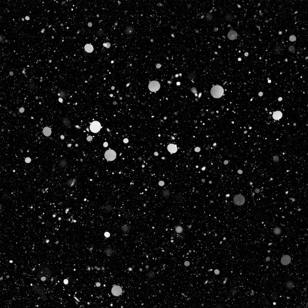 黒い夜の背景に孤立した自然な白い雪テクスチャ効果
