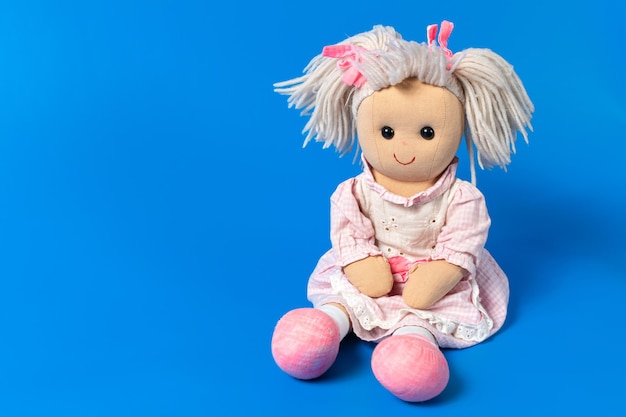 Photo isolated old doll toy for a child