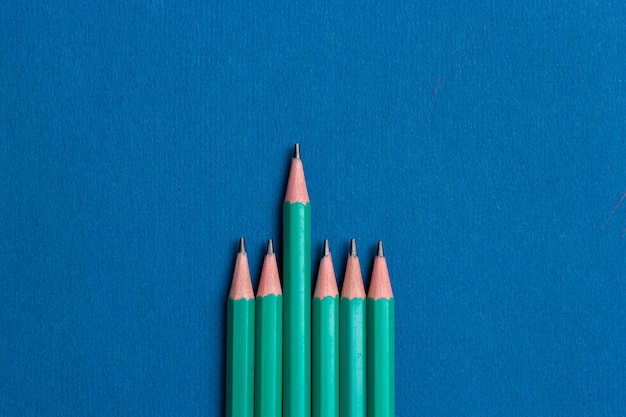 isolated pencils on blue background