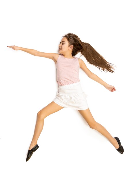 Isolated photo of cute girl jumping in dance