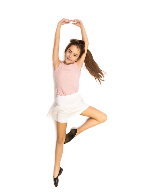 Isolated photo of cute smiling girl dancing ballet