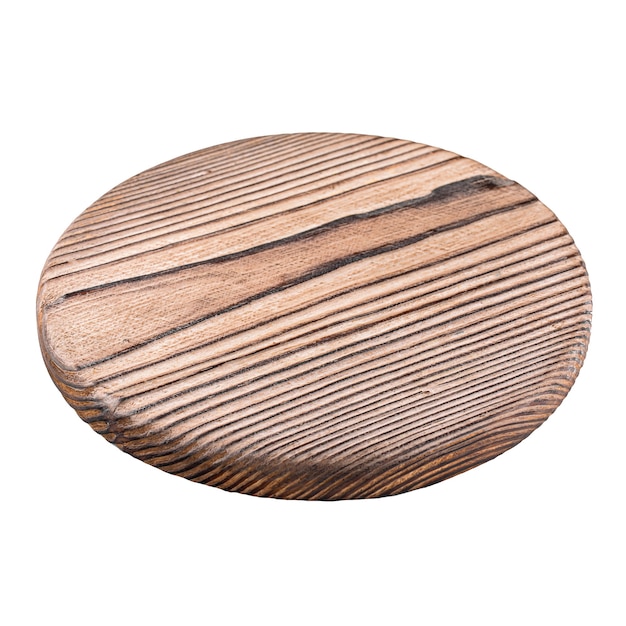 Photo isolated round burnt wooden serving board on white